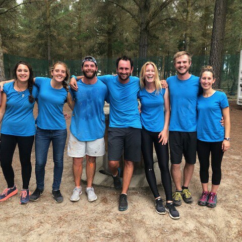 a group of people posing for a photo