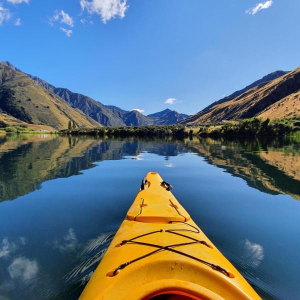 a lake with a mountain in the background